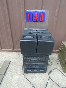 lot 140 image: Emerson garage radio with speakers & remote. Works. As shown.
