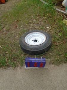 lot 145 image: Trailer tire 4 hole. 4.80 x 12. As shown.