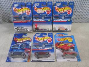 lot 152 image: (EC1) Assorted Hot Wheels in Packag...