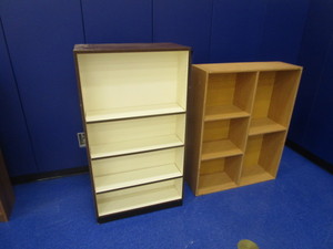 lot 22 image: Shelving Unit 12x38x4 Double Sided Book Shelf 17x30x55