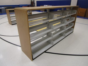 lot 32 image: Double Sided Bookshelf 25x110x55