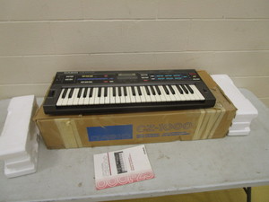 lot 163 image: Casio Keyboard