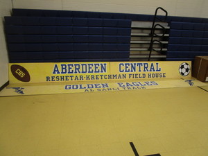 lot 251 image: (2) Aberdeen Central Sports Aluminum Signs 2x20