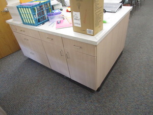 lot 135 image: Island 51x74x3 (4) Cabinets & Countertop (has been disassembled)