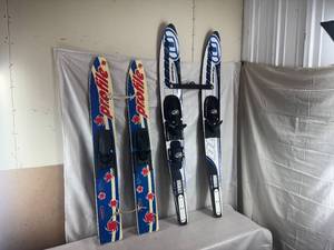 lot 1 image: Trainer Water Skis (Two Pairs)
