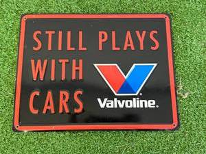 lot 13 image: Valvoline Still Plays With Cars Metal Sign
