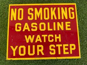 lot 22 image: No Smoking Gasoline Watch Your Step Porcelain Sign