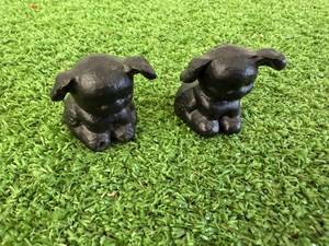 lot 99 image: Pair of Griswold Cast Iron Puppies