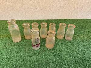 lot 142 image: Vintage Glass Milk Bottles