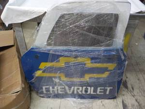 lot 26 image: Metal Chevrolet Door Dcor 33 x 37...