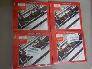 lot 112 image: 4 The Beatles CDs...