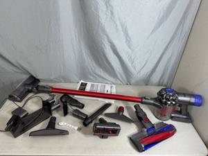 lot 28 image: Dyson V6 Cordless Stick Vacuum with Charger and Accessories
