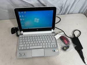 lot 43 image: HP Mini Laptop Computer with Cord and Mouse