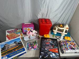 lot 77 image: Vintage Toys, Legos, Garfield Lunch Box, and More