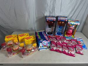 lot 82 image: Assorted Candy, Gumball Machines, Sugar Babies, and More