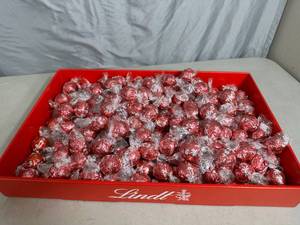 lot 84 image: Over 4 Lbs of Lindt Lindor Strawberries and Cream Chocolate Truffles