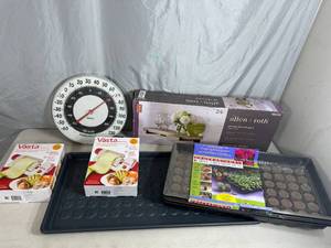 lot 90 image: Boot Tray, Plant Starter Greehouse, New Allen Roth Wall Shelf, New Vasta Slicers, Etc