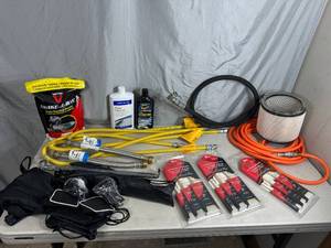 lot 94 image: Air Hose, Gas Lines, New Paint Brushes, New Snake Repellent, and More