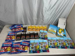 lot 135 image: Assorted Candy, Chocolove Chocolate Bars, Haribo Gummy Candy