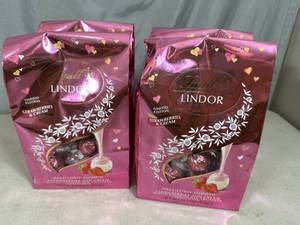 lot 136 image: 4 Large Bags of Lindt Lindor Strawberries and Cream Chocolate Truffles