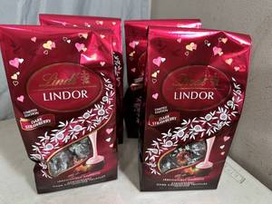 lot 147 image: 4 Bags Lindt Lindor Dark Strawberry Chocolate Truffles