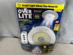 lot 178 image: New Over Lite Remote Controlled  Motion Activated Light Fixture