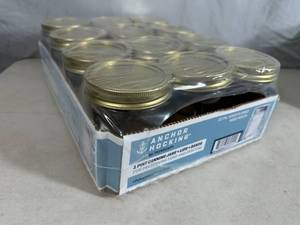 lot 245 image: 12 New Anchor Hocking Canning Jars - 1 pint Wide Mouth