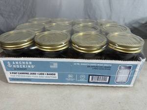 lot 246 image: 12 New Anchor Hocking Canning Jars - 1 pint Wide Mouth