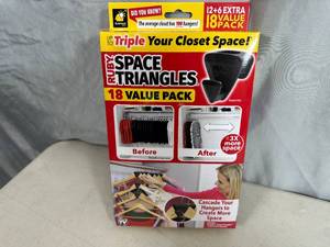 lot 271 image: New Pack of 18 Ruby Space Triangles For Closet Organization