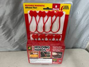 lot 272 image: New 8 Pack of Ruby Holding Hands Magnetic Silicone Ties  Organizers