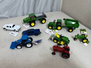 lot 283 image: New John Deere, Ford Truck, Tractors, Etc