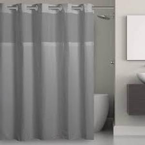lot 40 image: Lot of Hookless Simply Solid 74 in. W x 71 in. L Polyester Shower Curtain in Solid White  Customer Returns See Pictures