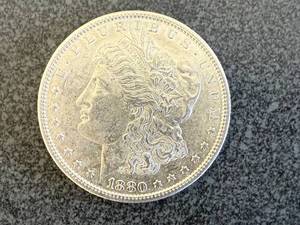 lot 12 image: 1880 S Morgan Silver Dollar