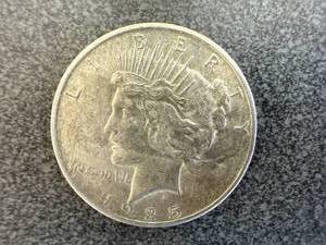 lot 27 image: 1925 Peace Silver Dollar