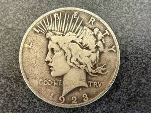 lot 28 image: 1923 Peace Silver Dollar