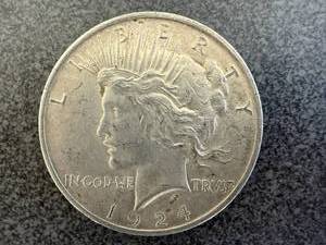 lot 31 image: 1924 Peace Silver Dollar