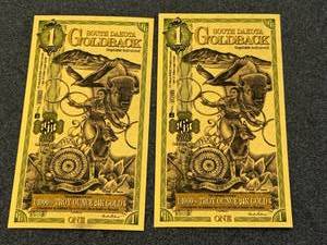 lot 40 image: 2 - South Dakota 1 Goldback 11000th 24K Gold Each