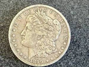 lot 44 image: 1899 O Morgan Silver Dollar