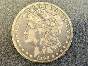 lot 58 image: 1898 O Morgan Silver Dollar