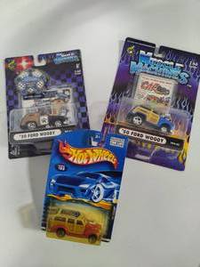 lot 29 image: Vintage Hot Wheels & Muscle Machines New in Packaging