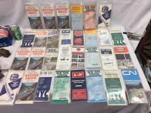 lot 273 image: Group 1960s U.S. Travel Maps - Train Time Tables