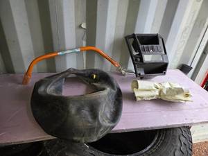lot 58 image: Inne Tube 23x8.5, Bow Saw Handle, Dashboard Piece