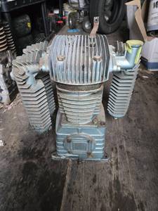 lot 63 image: Air Compressor Pump marked 0203 on the body.