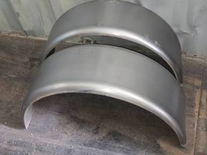 lot 85 image: Pair of Metal Fenders approximately 32 in length, 10 12 wide