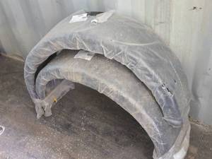 lot 87 image: Pair of Plastic Trailer Fenders with width of approximately 36 inches and a height of about 11 inches