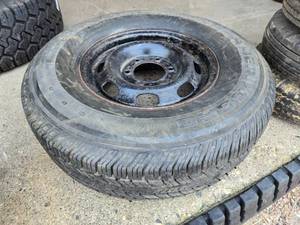 lot 161 image: Used Tire with Wheel Rim P23575R15