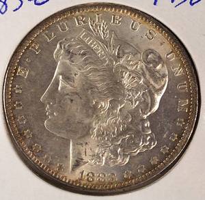 lot 7 image: 1883-O Morgan Silver Dollar MS 62