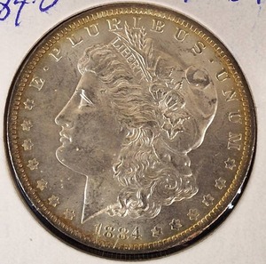 lot 8 image: 1884-O Morgan Silver Dollar MS 64