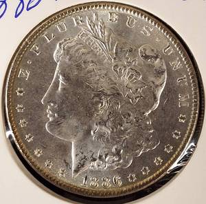 lot 10 image: 1886-P Morgan Silver Dollar MS 62