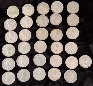 lot 28 image: 31 Canadian 80% Silver Quarters